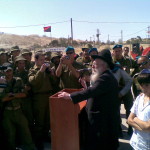 Rabbi Henig speaking to the troops.